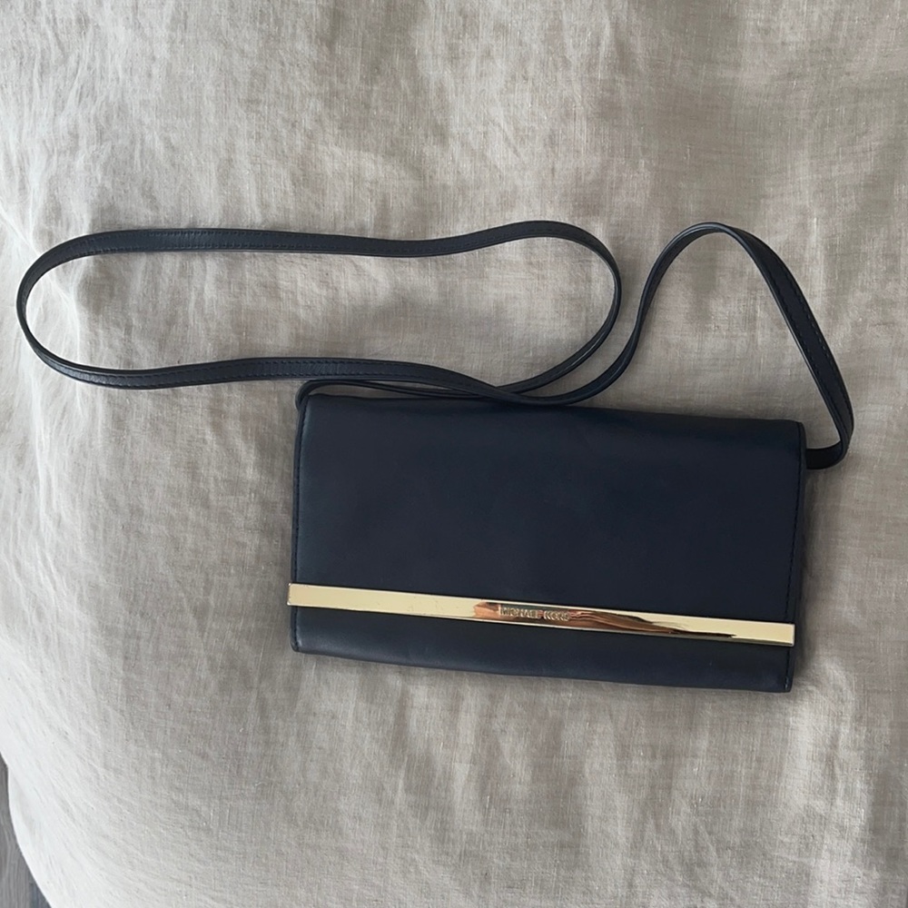 Michael Kors black and gold clutch